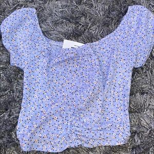 Tilly’s floral blue blouse